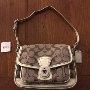 Coach purse, never used - still has the tag